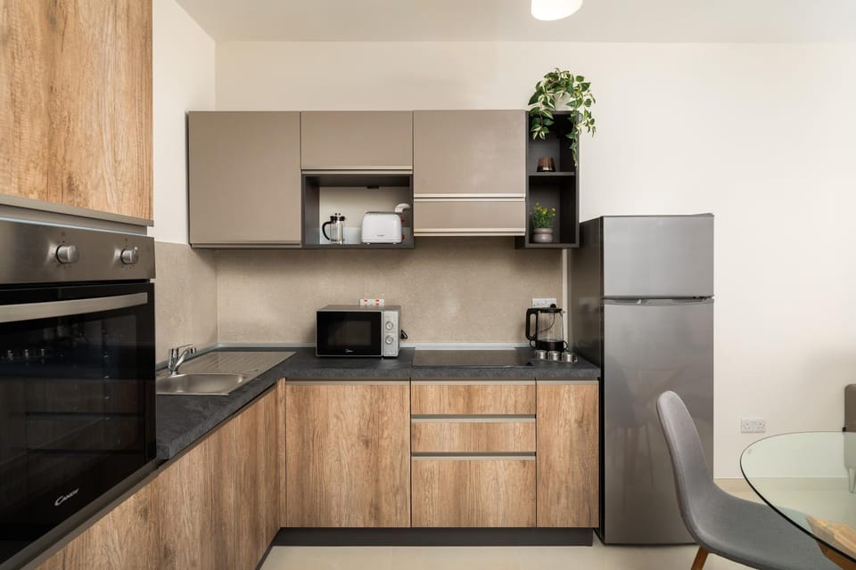 Edka Suites - Modern Sunlit 2BD Apartments with Balconies - Close to Sliema Promenade, St Julian's & St Georges Bay Apartment in Sliema
