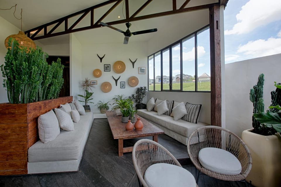 Living room, Seating area, Garden view, Pool view