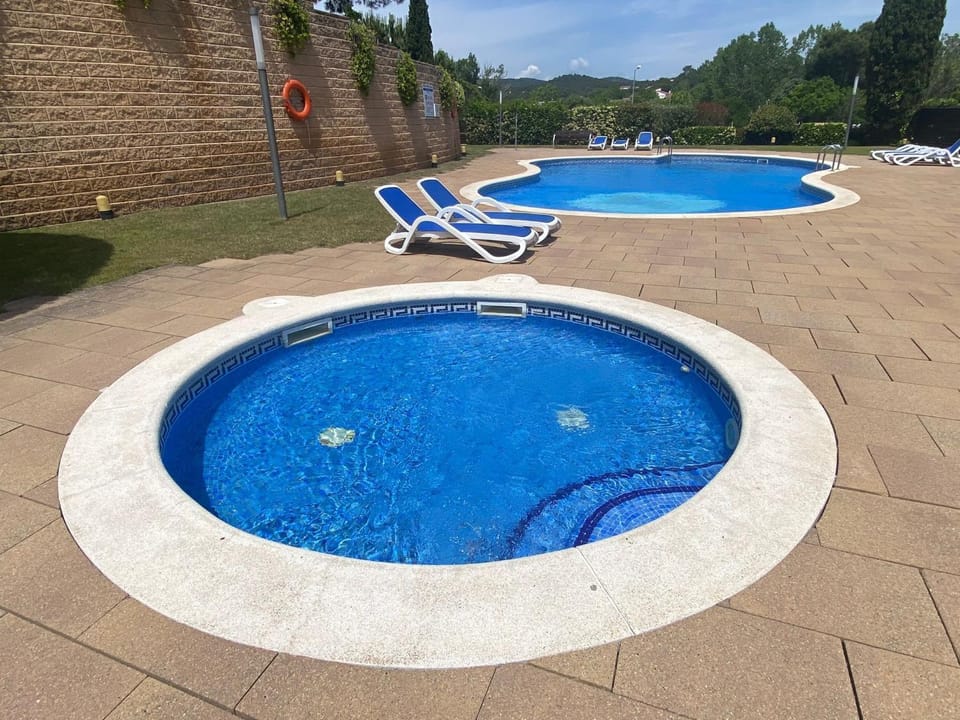 Property building, Living room, Swimming pool