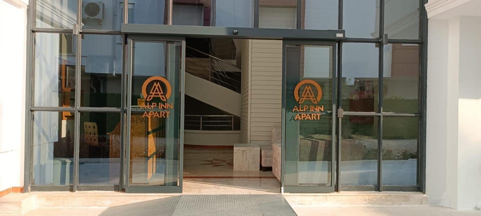 Property building, Facade/entrance, Day, Property logo or sign