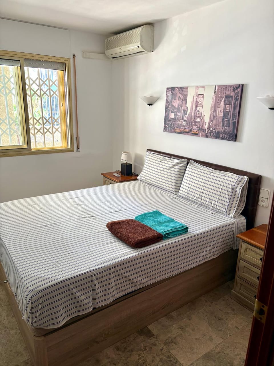 Bed, Photo of the whole room, Bedroom, towels, air conditioner