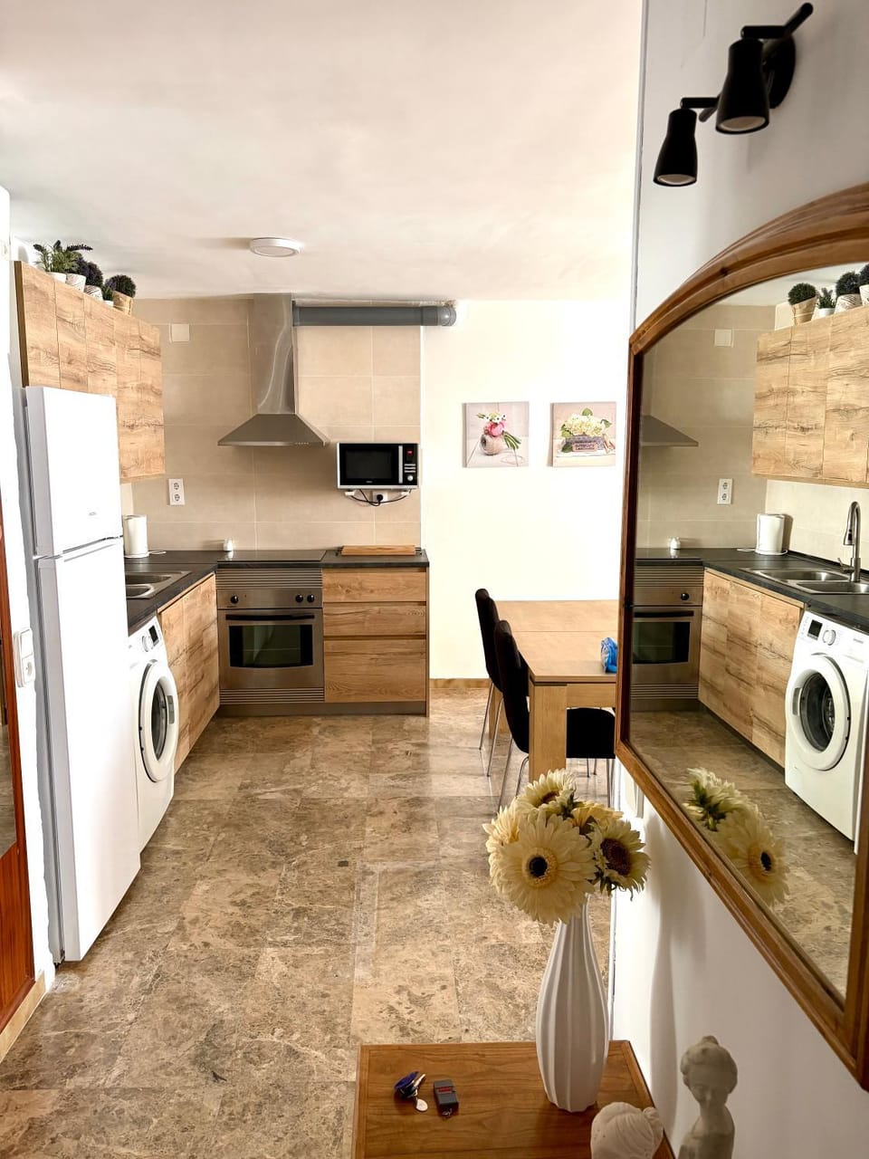Kitchen or kitchenette, oven, stove, washing machine