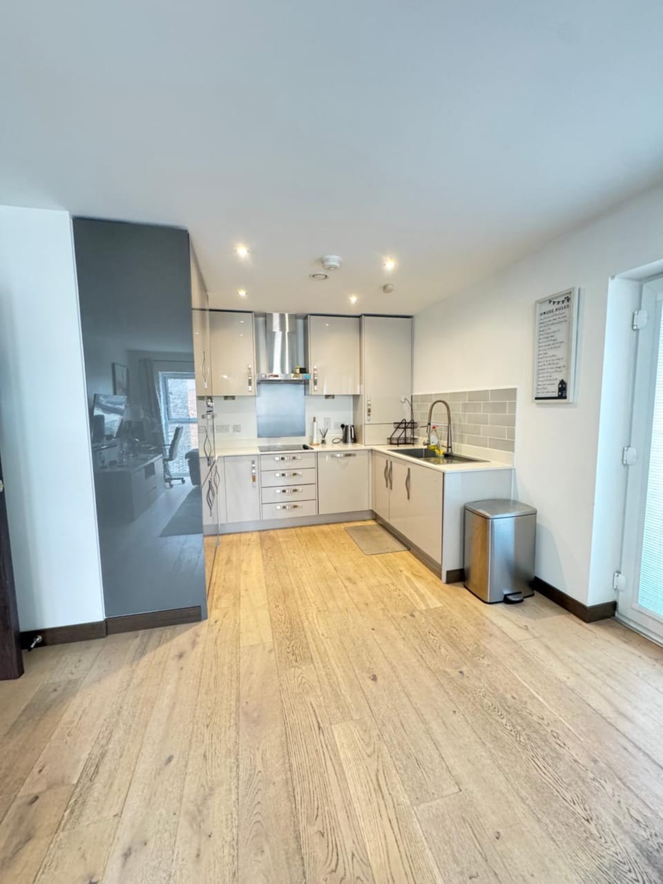 Kitchen or kitchenette, dishwasher, microwave, stove, washing machine