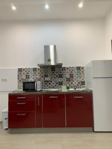 Kitchen or kitchenette, stove