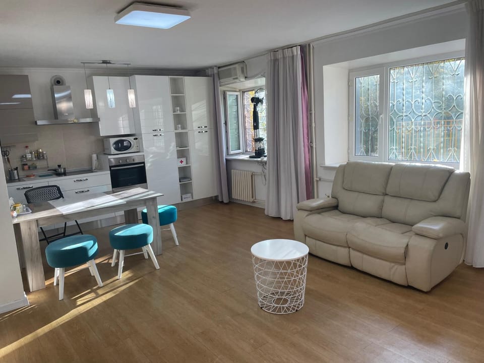 Seating area, microwave, oven, kitchen, air conditioner