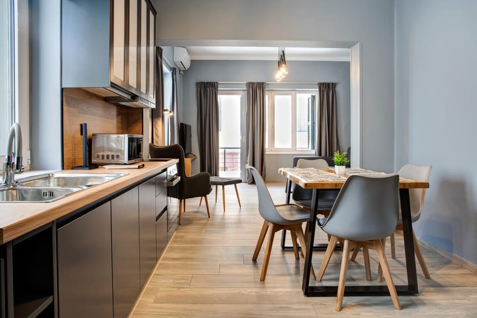 Kitchen or kitchenette, Living room, Seating area, Dining area, oven, stove, air conditioner