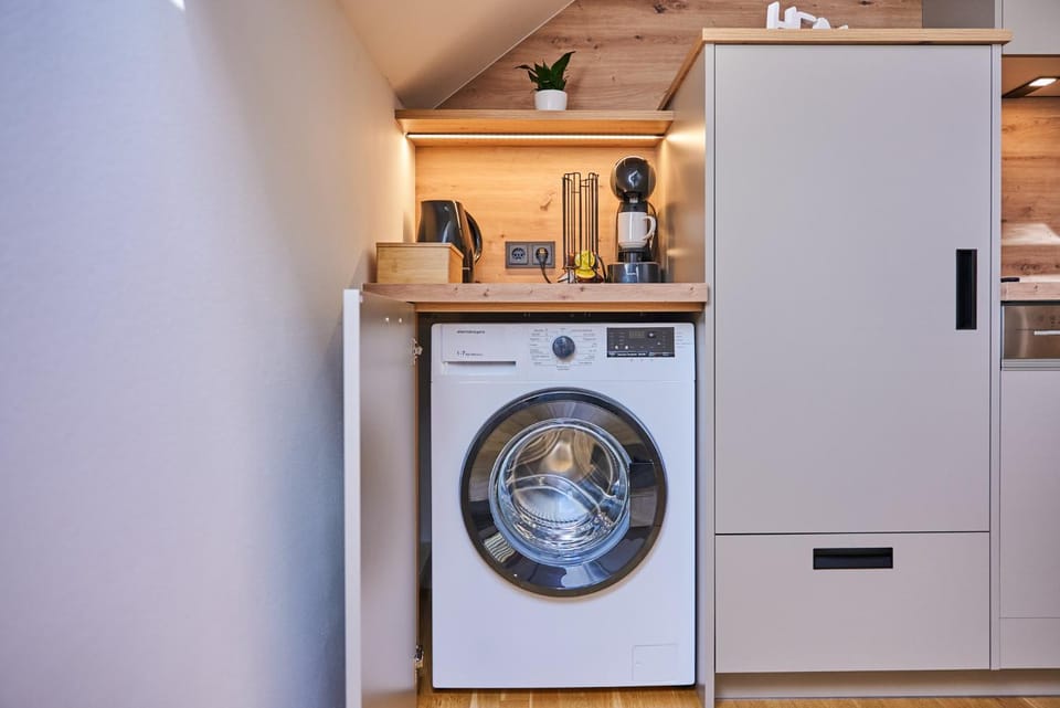 Kitchen or kitchenette, washing machine