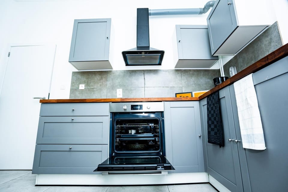 Kitchen or kitchenette, oven