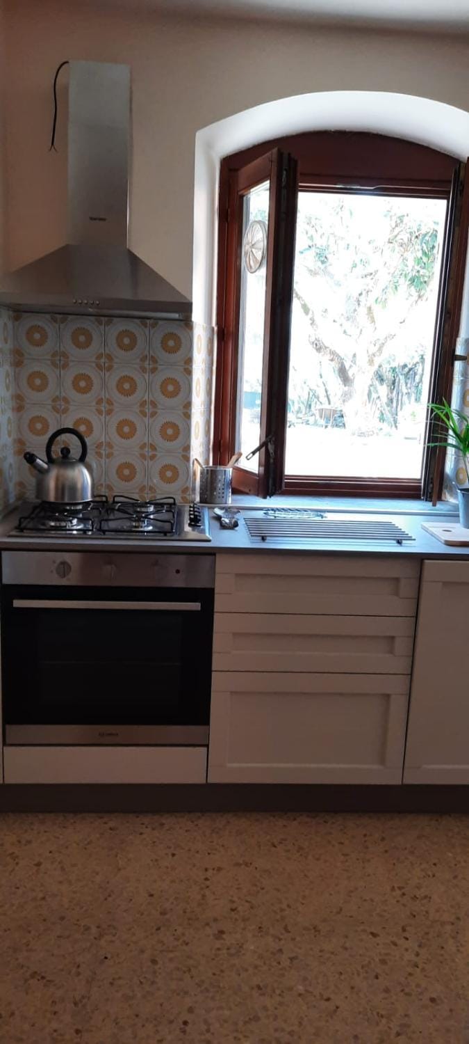 Kitchen or kitchenette, stove