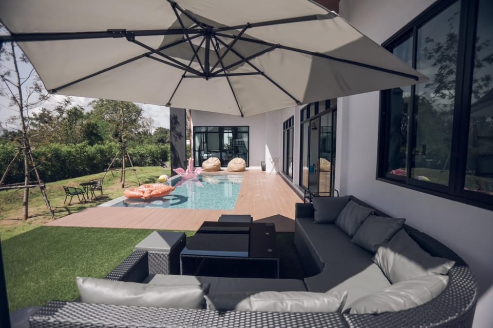 Property building, Day, Natural landscape, Garden, View (from property/room), Seating area, Garden view, Swimming pool, sunbed