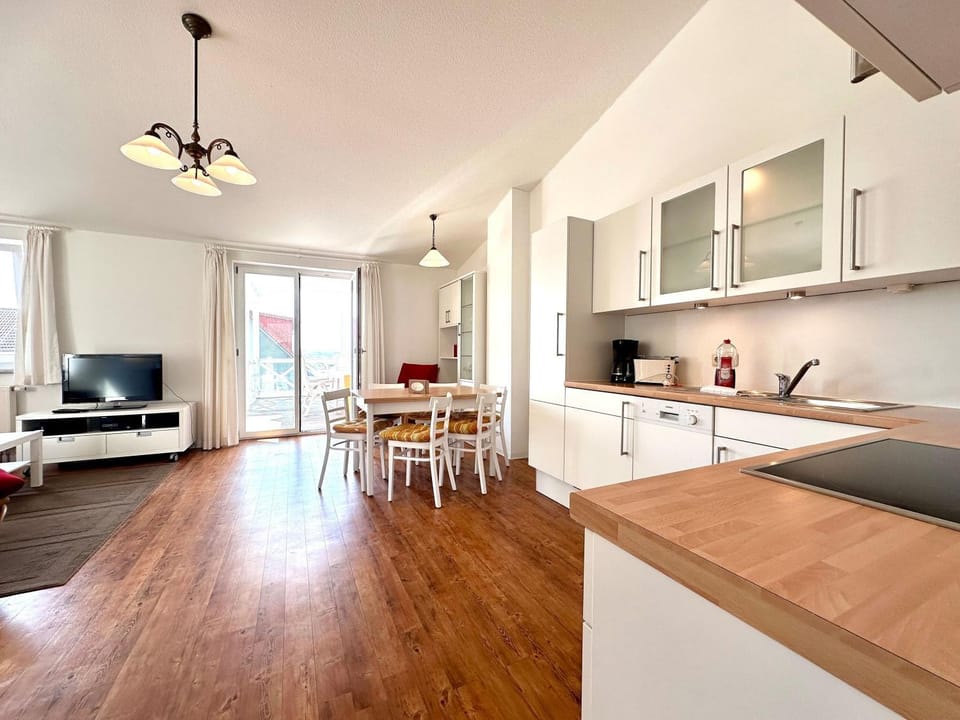 TV and multimedia, Kitchen or kitchenette, Living room, Seating area, dishwasher, stove