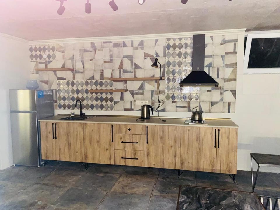 Kitchen or kitchenette, oven