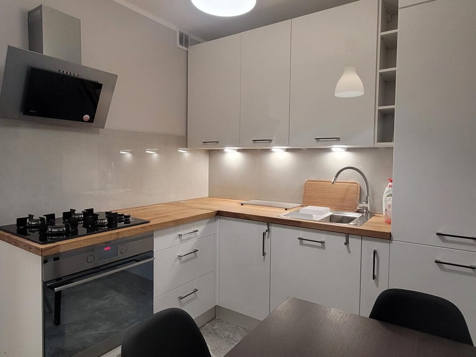 Kitchen or kitchenette, oven, stove