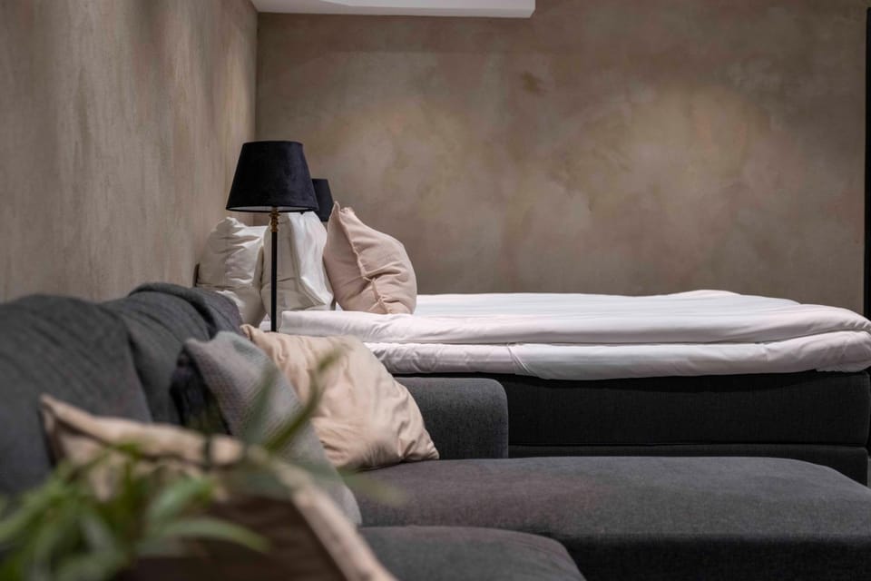 Bed, Living room, Seating area, Bedroom