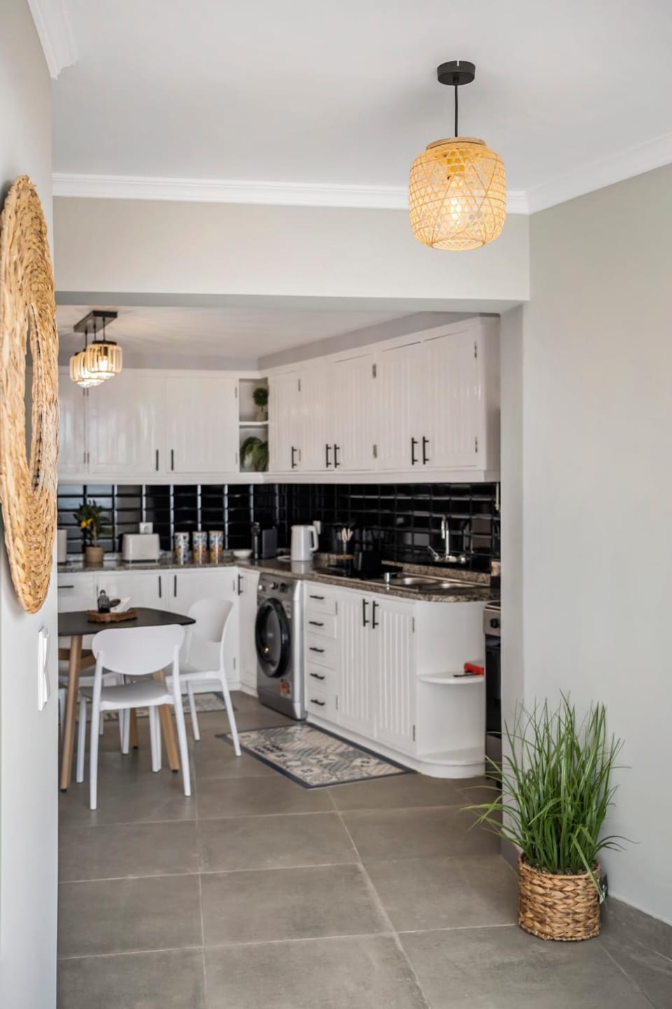 Kitchen or kitchenette, Dining area, oven, stove, washing machine, dryer