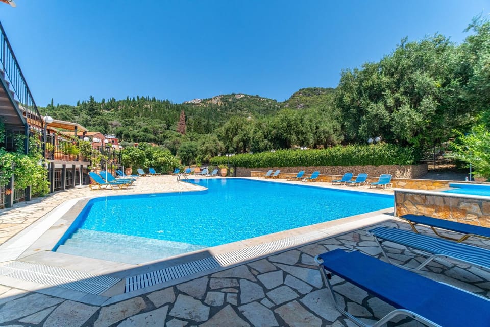 Property building, Living room, Swimming pool