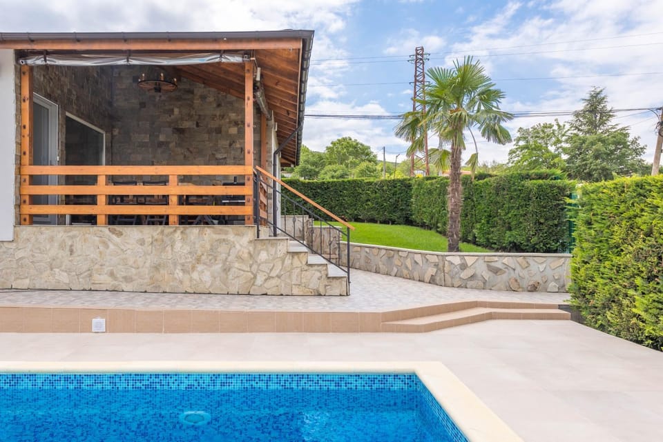 Property building, Patio, Day, Garden, Pool view, Swimming pool