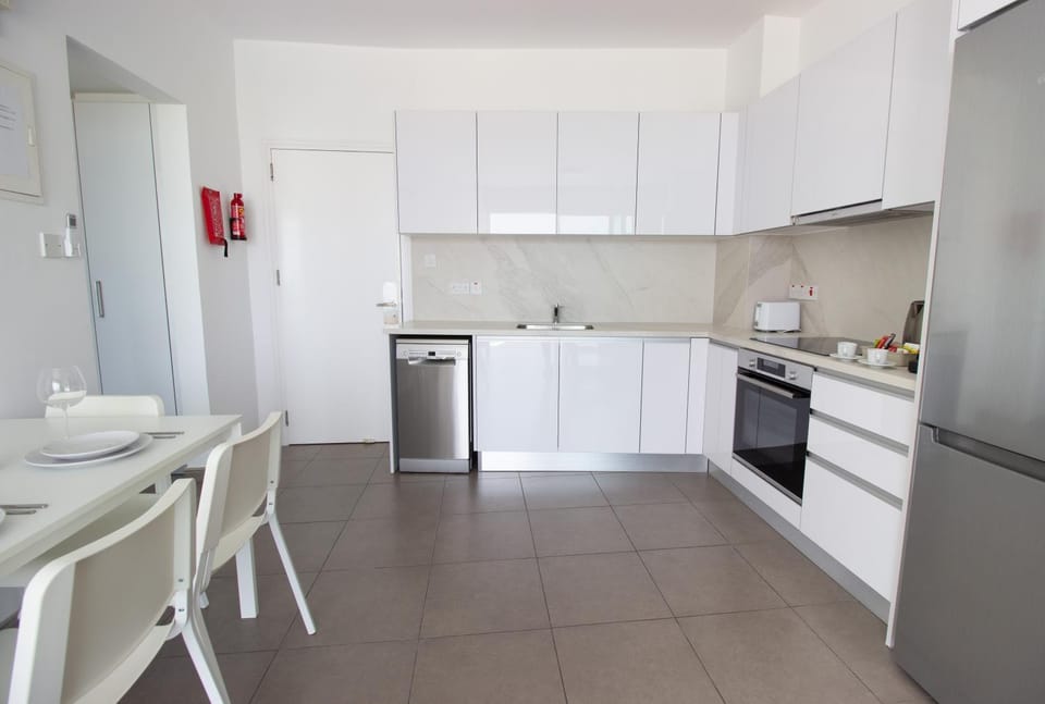Kitchen or kitchenette, Dining area, dishwasher, oven, stove, toaster