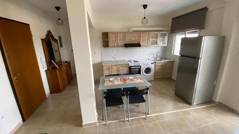 Kitchen or kitchenette, Dining area, oven, stove, washing machine