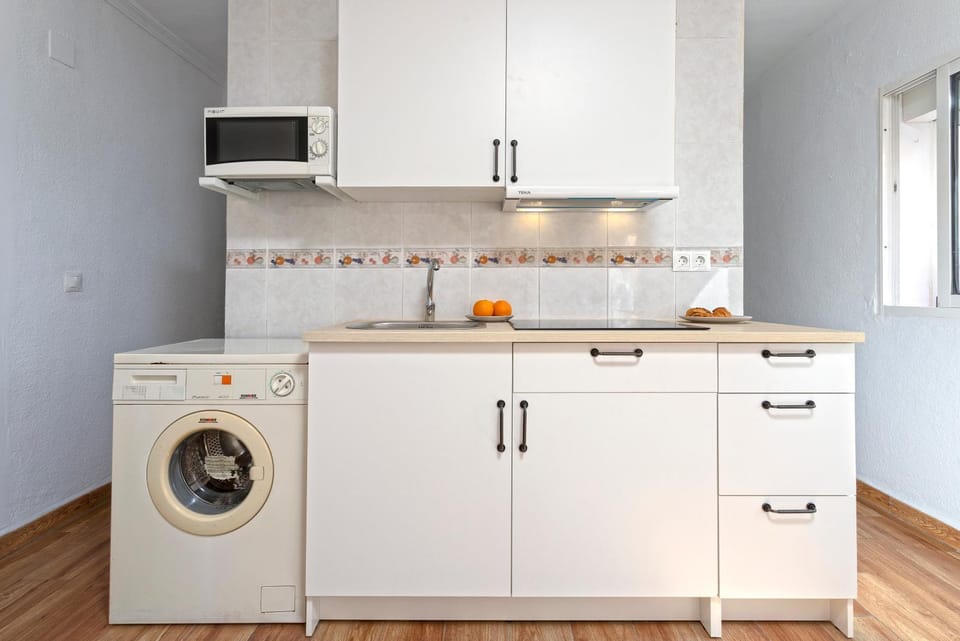 Kitchen or kitchenette, microwave, washing machine, kitchen
