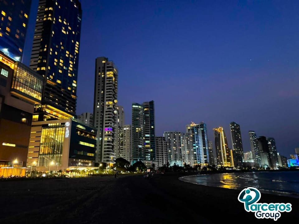 Property building, Nearby landmark, Night, Natural landscape, City view, Sea view