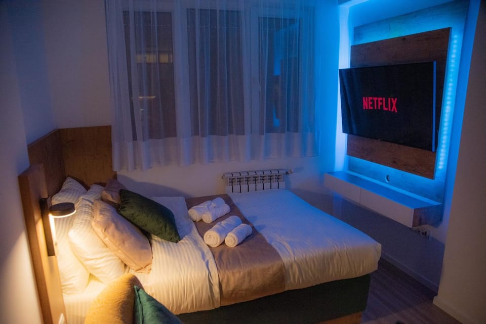 Bed, TV and multimedia