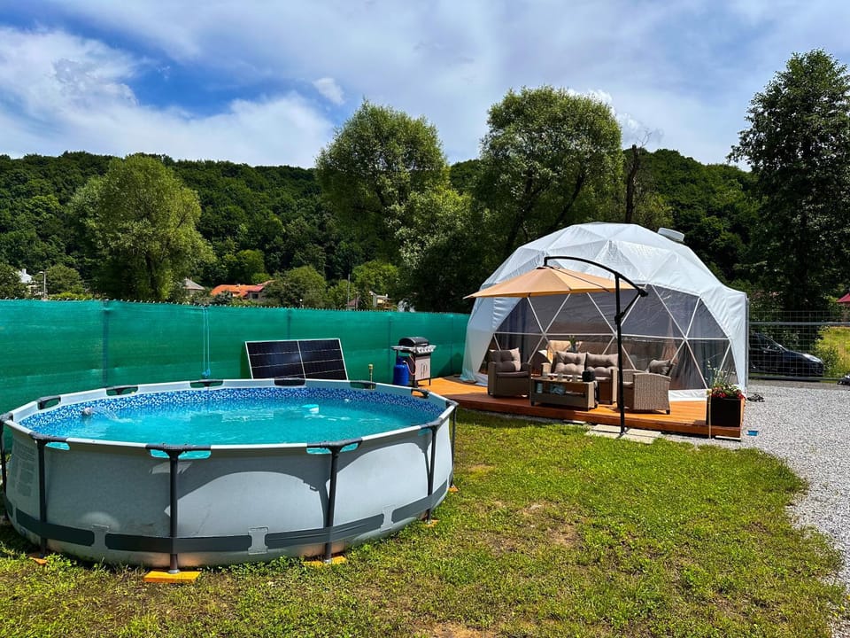 Property building, Off site, Day, Natural landscape, Pool view, Swimming pool