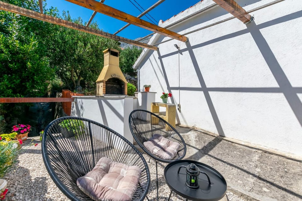 Property building, BBQ facilities, Seating area