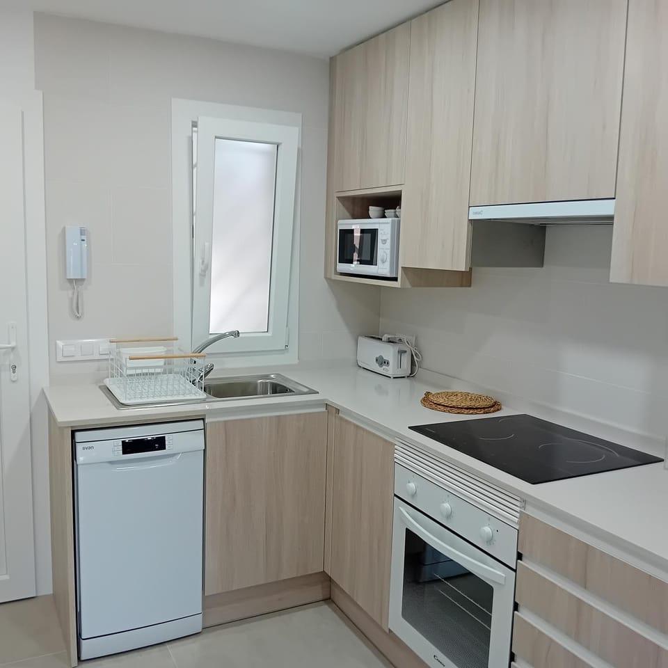 Kitchen or kitchenette, dishwasher, oven, pet friendly, stove, toaster