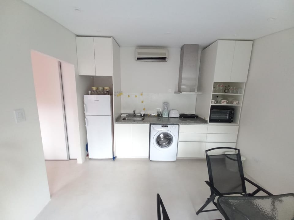 Kitchen or kitchenette, oven, air conditioner