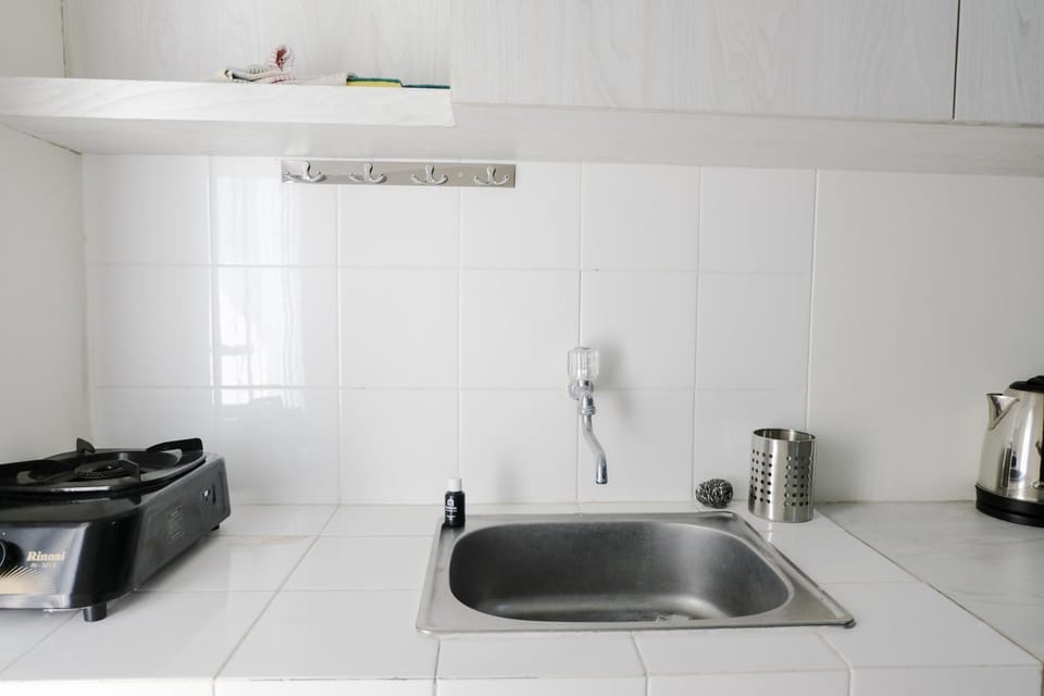 Homey 1BR Apartment with Extra Room at Parahyangan Residence By Travelio Apartment in Parongpong
