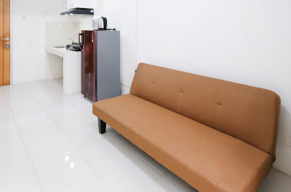 Homey 2BR at Puncak Permai Apartment By Travelio Apartment in Surabaya