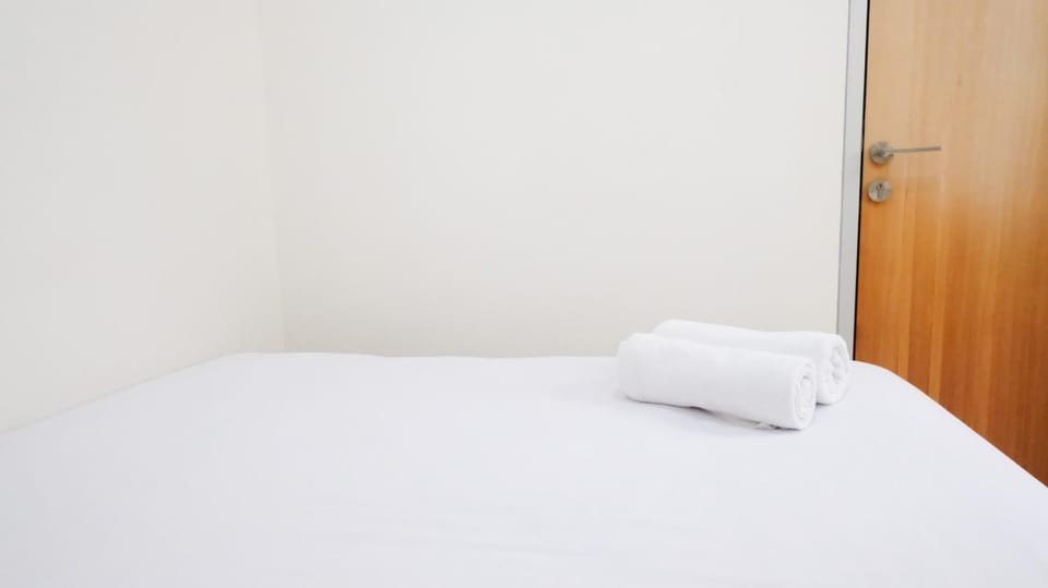 Homey 2BR at Puncak Permai Apartment By Travelio Apartment in Surabaya