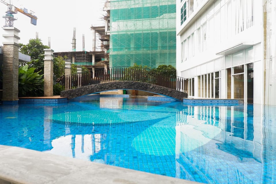 3BR with Private Lift Connected to Mall Grand Sungkono Lagoon Apartment By Travelio Apartment in Surabaya