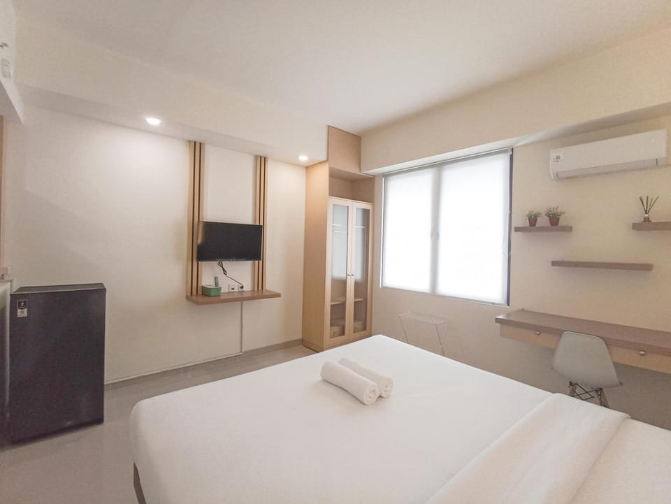 Cozy Stay Studio Room at Altuz Seturan Yogyakarta Apartment By Travelio Apartment in Special Region of Yogyakarta