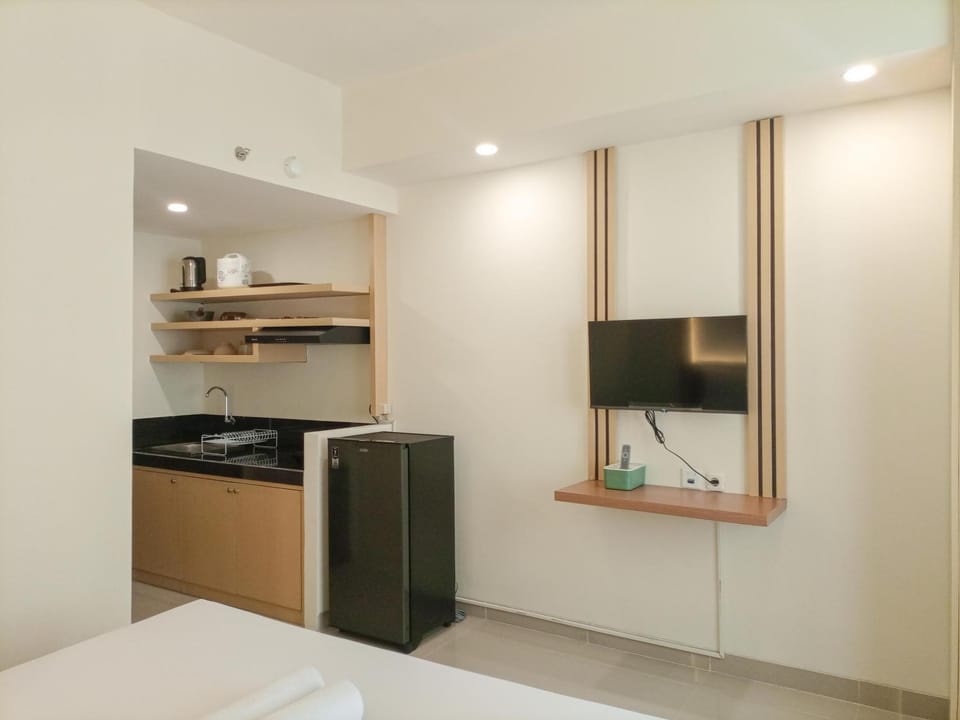 Cozy Stay Studio Room at Altuz Seturan Yogyakarta Apartment By Travelio Apartment in Special Region of Yogyakarta