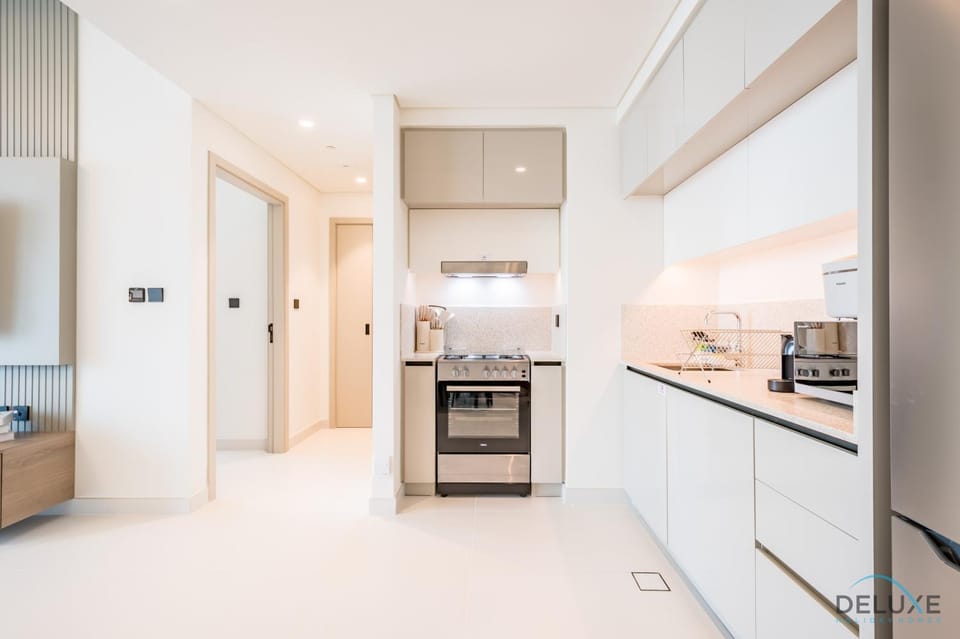 Kitchen or kitchenette, dishwasher, oven, stove, toaster