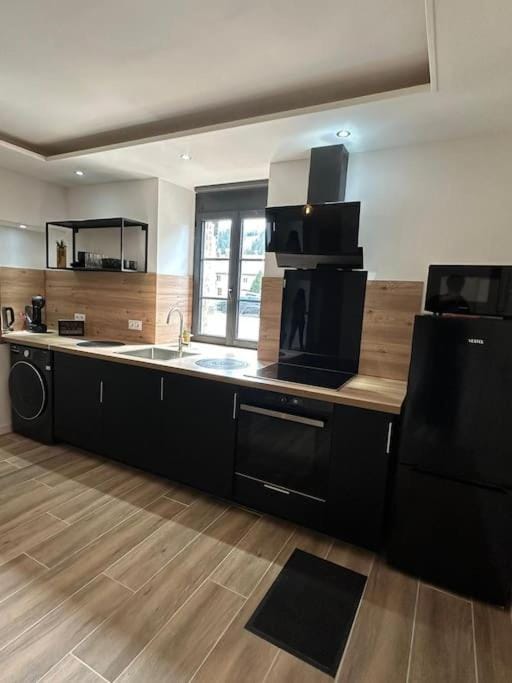 Kitchen or kitchenette, oven, stove