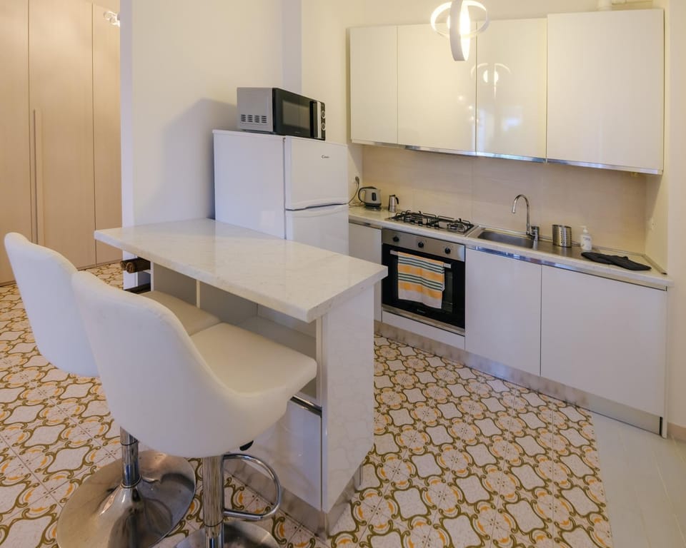 Kitchen or kitchenette, Dining area, dishwasher, oven, stove