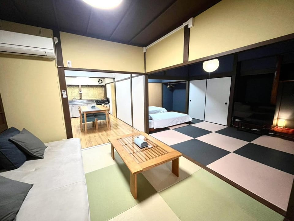 Bed, Living room, Seating area, Bedroom