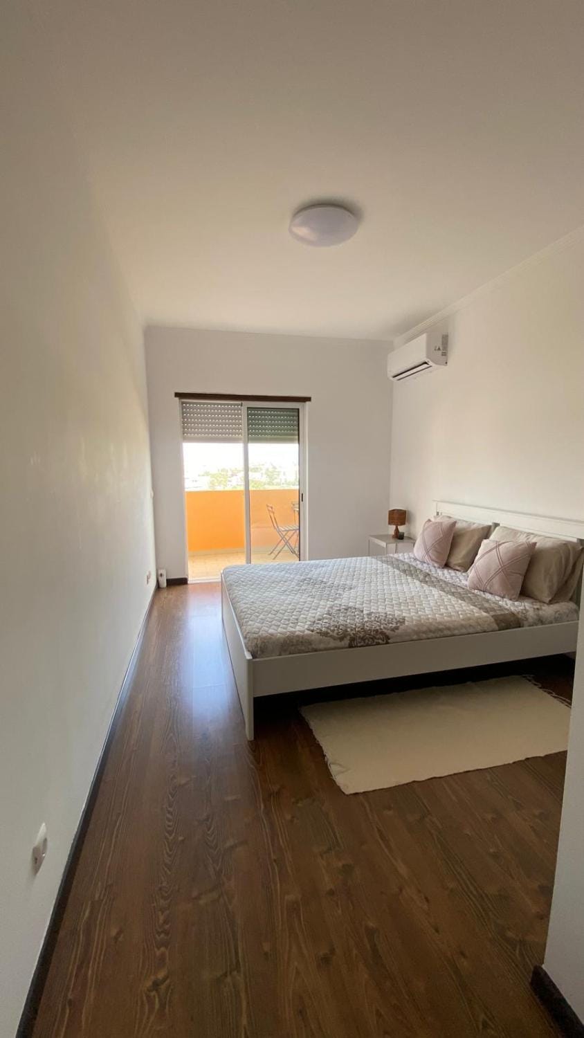 Photo of the whole room, Bedroom, air conditioner