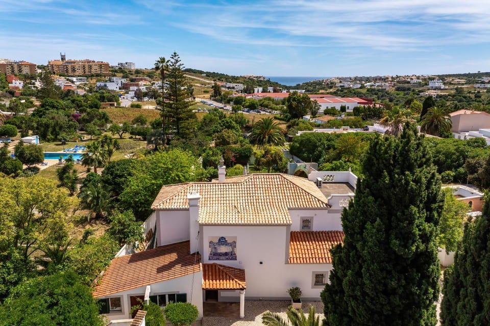 Property building, Day, Neighbourhood, Natural landscape, Bird's eye view