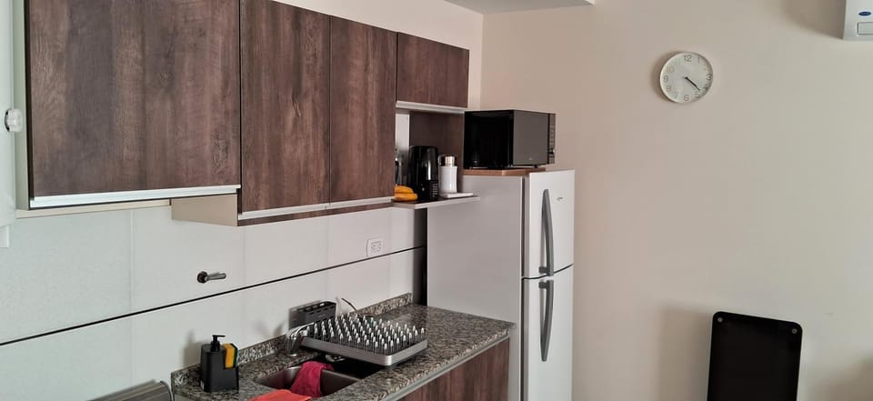Kitchen or kitchenette, oven, air conditioner
