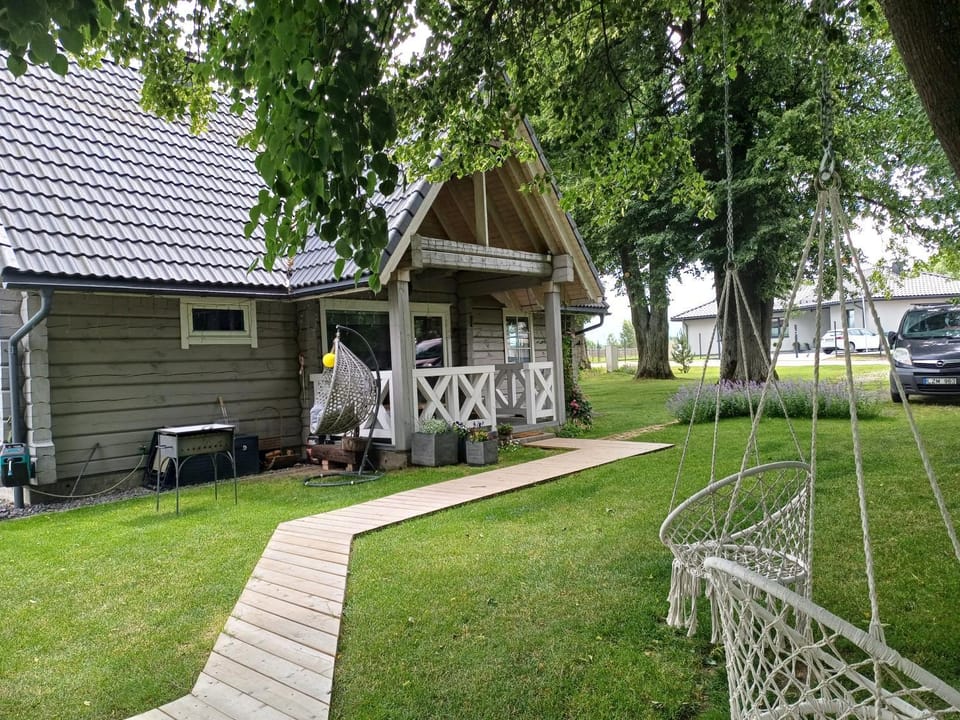 Namelis su pirtimi House in Lithuania