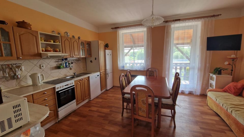 Kitchen or kitchenette, dishwasher, microwave, oven, stove