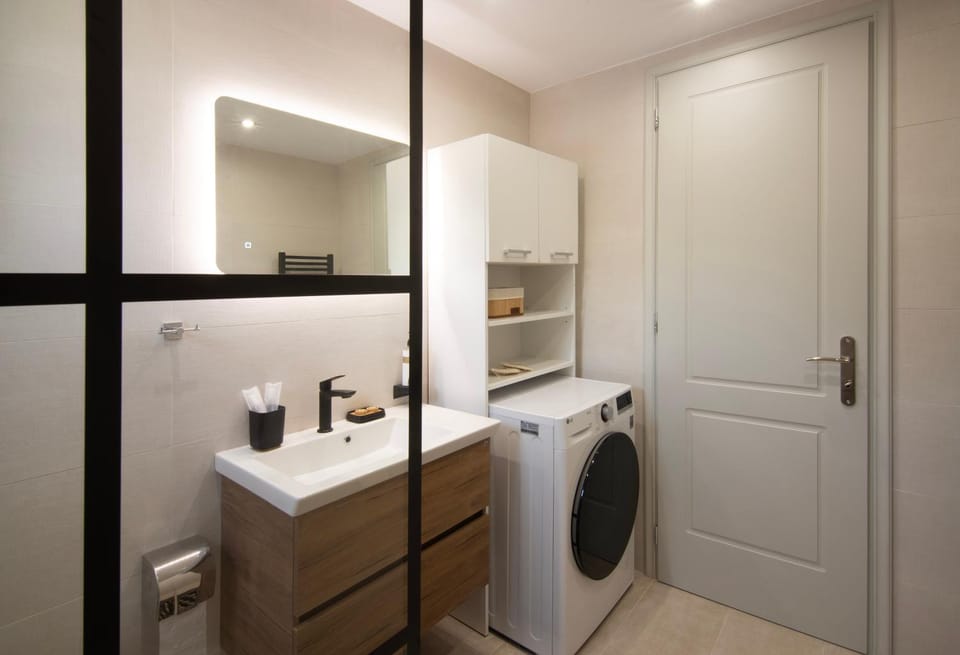 Bathroom, towels, washing machine, dryer