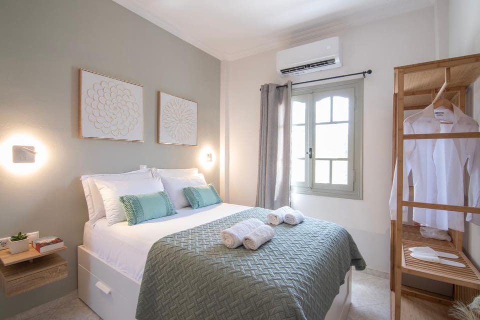 Bed, Bedroom, towels, wardrobe, air conditioner