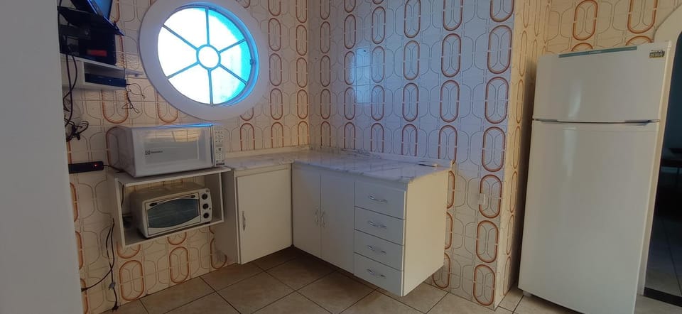 Kitchen or kitchenette, oven, stove