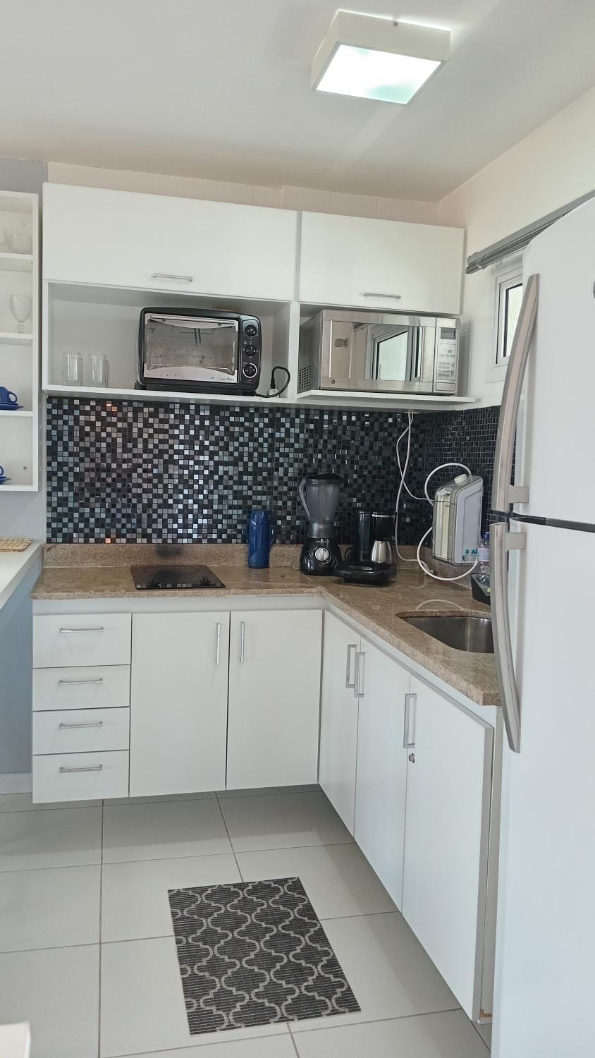 Kitchen or kitchenette, microwave, oven, stove, kitchen