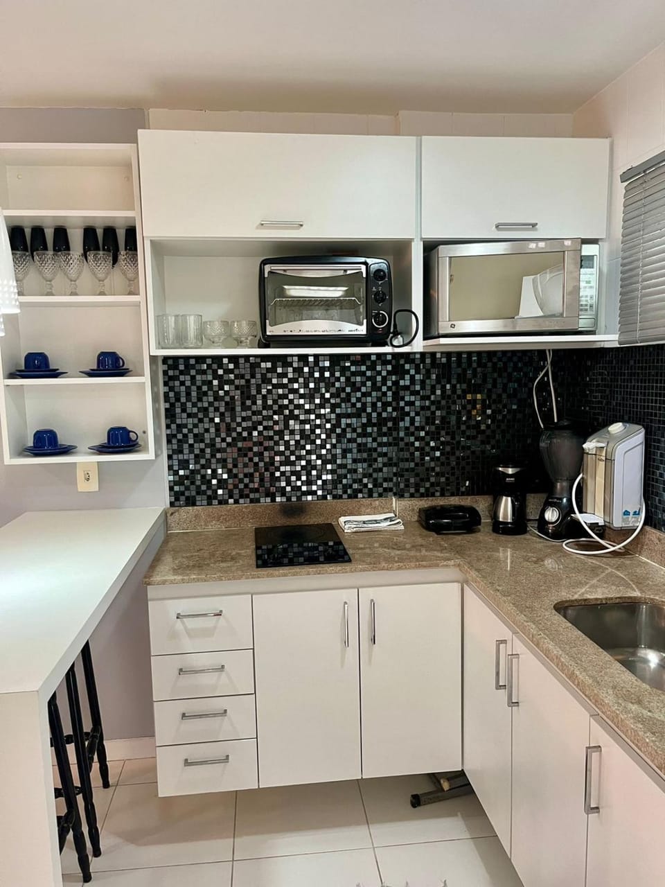 Kitchen or kitchenette, stove, toaster